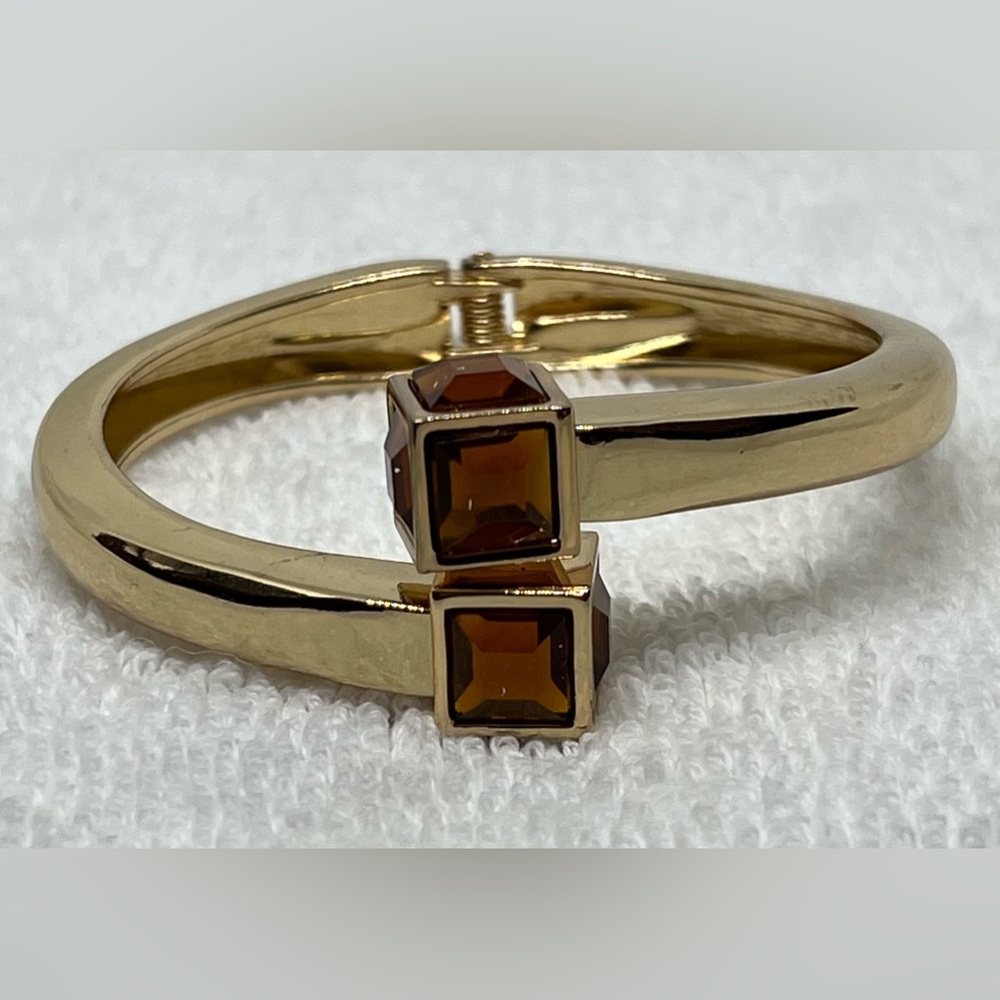 Gold Tone Clamper Bracelet with Squared Brown Amber Colored Crystals